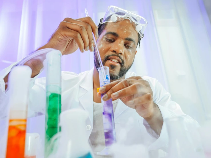 a man in a lab coat holding a tube filled with liquid, inspired by Dr. Atl, pexels contest winner, jemal shabazz, purple, performing, avatar image