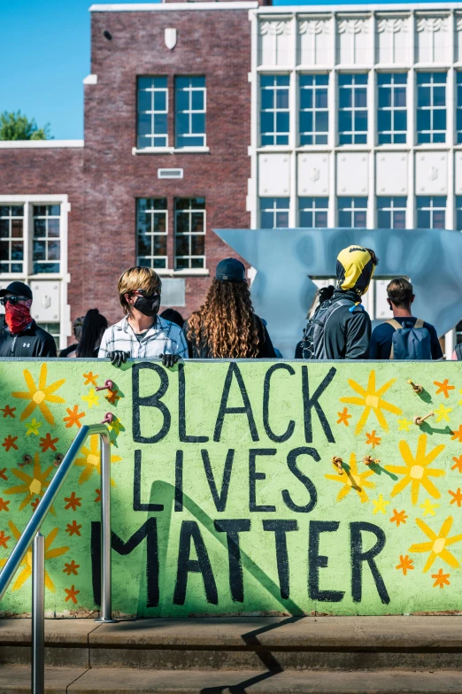 a group of people holding a banner that says black lives matter, by Nina Hamnett, trending on unsplash, bright sunny day, slide show, schools, dark. no text