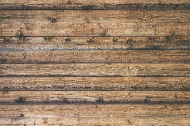 a close up view of a wooden wall