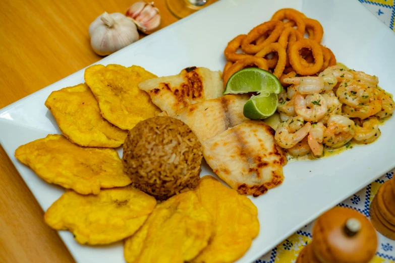 a close up of a plate of food on a table, by Carey Morris, pexels, colombian, saltwater, thumbnail, 4262862863