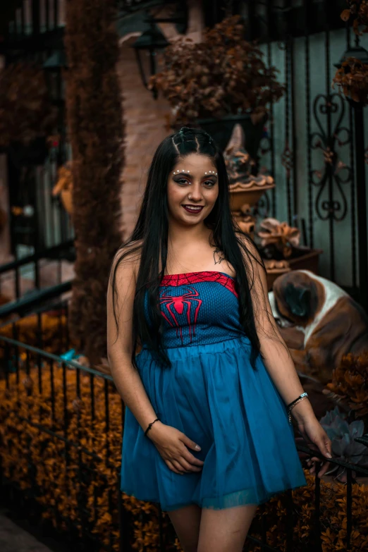 a woman in a blue dress posing for a picture, inspired by reyna rochin, pexels contest winner, spider woman, tlaquepaque, melanie martinez, indian