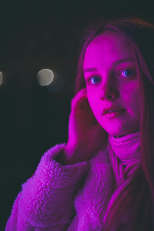 a woman talking on a cell phone in the dark, inspired by Elsa Bleda, pexels contest winner, glowing magenta laser eyes, portrait of white teenage girl, purple and red, wearing a turtleneck and jacket