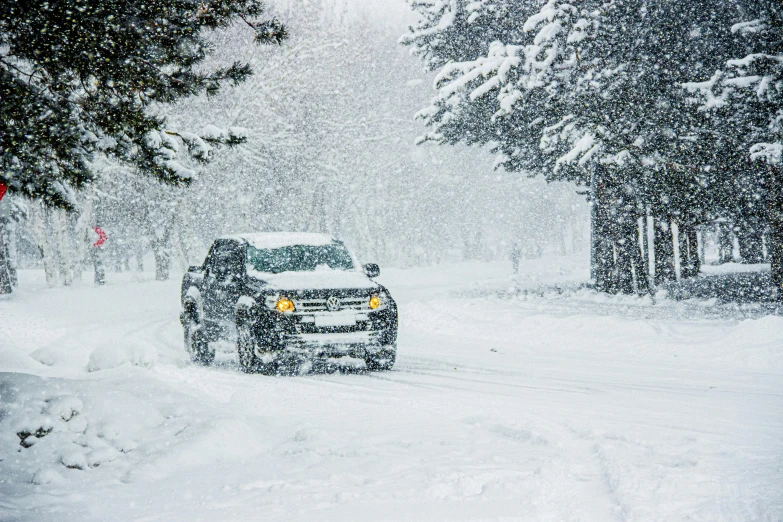 a truck driving down a snow covered road, pexels contest winner, square, snowstorm ::5, car, various posed