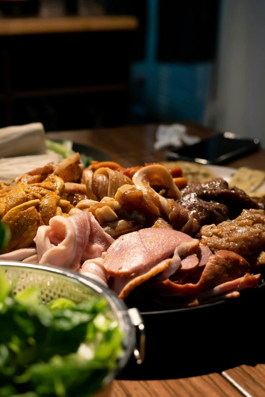 a close up of a plate of food on a table, happening, bowl filled with food, meat, in the evening, at home