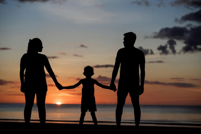 a family holding hands on the beach at sunset, by Jesper Knudsen, pexels contest winner, avatar image, plain background, husband wife and son, thumbnail