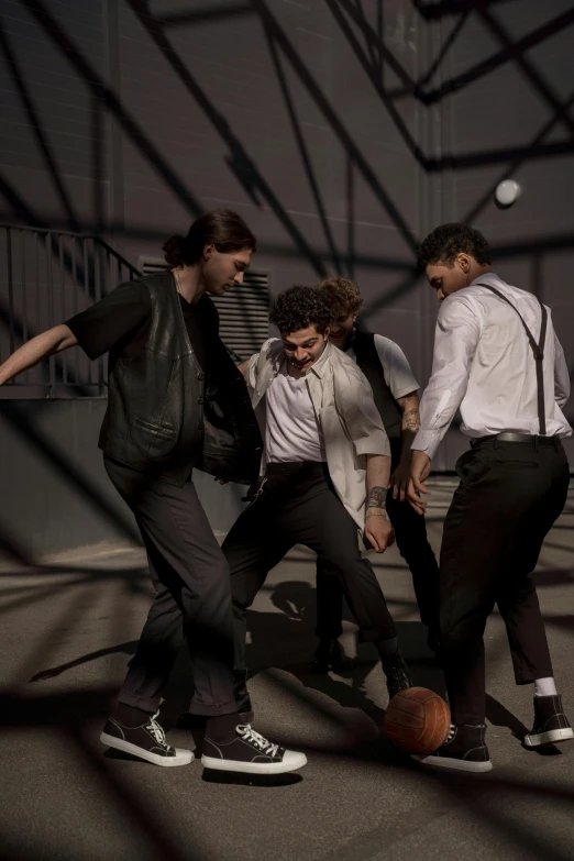 a group of young men playing a game of basketball, an album cover, inspired by Caravaggio, renaissance, high fashion photoshoot, ignant, dynamic hair movement, band promo photo