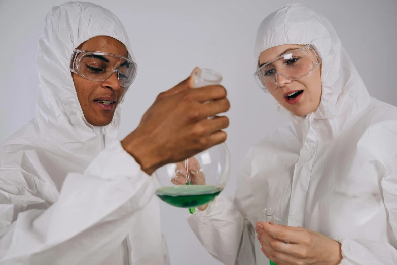 a couple of people that are holding some kind of liquid, trending on pexels, analytical art, labcoats, green saliva, thumbnail, explorers