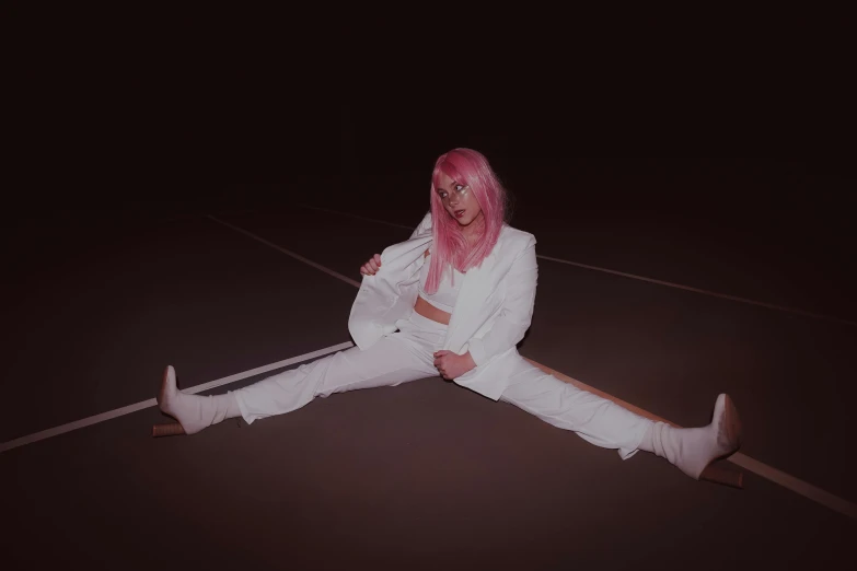 a woman with pink hair sitting on a tennis court, an album cover, inspired by Elsa Bleda, unsplash, magical realism, white suit, night time low light, full body pose, wearing a track suit