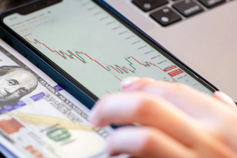 a close up of a person using a cell phone, a digital rendering, trending on pexels, analytical art, trading stocks, excel running on the computer, guilloche, brown