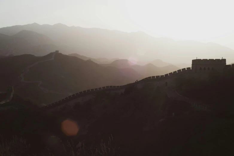 a view of the great wall of china at sunset, pexels contest winner, happening, grey, background image, alessio albi, black