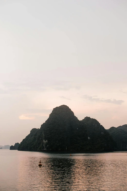 a boat floating on top of a large body of water, by Patrick Ching, trending on vsco, chiseled formations, bao phan, late summer evening