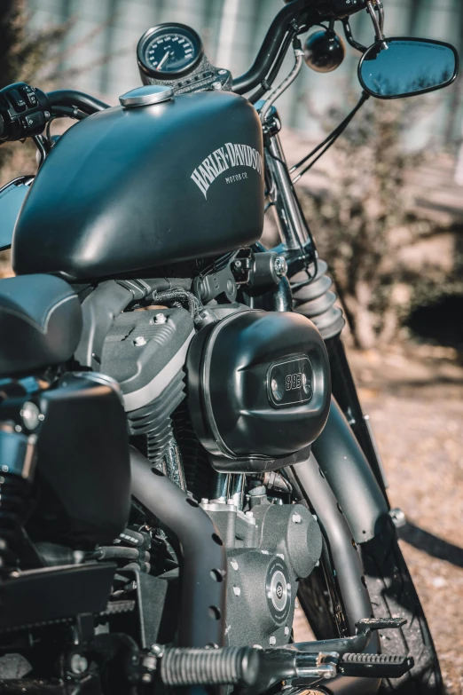 a close up of a motorcycle parked on a dirt road, profile image, matte black, 🚿🗝📝