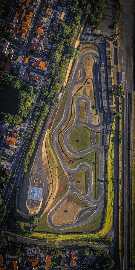 an aerial view of a race track, by Jacob Toorenvliet, unsplash contest winner, in an eco city, liege, 15081959 21121991 01012000 4k, são paulo