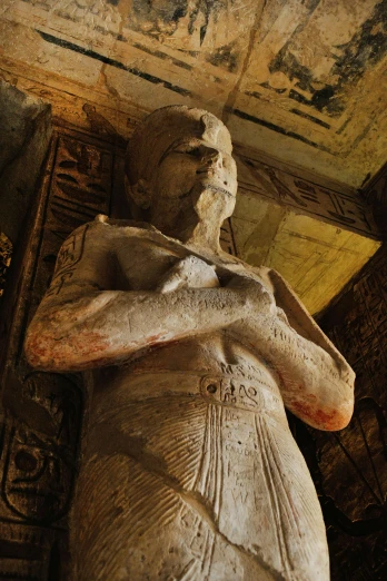 a close up of a statue in a building, inside a tomb, egyptian clothing, necropolis, upper torso