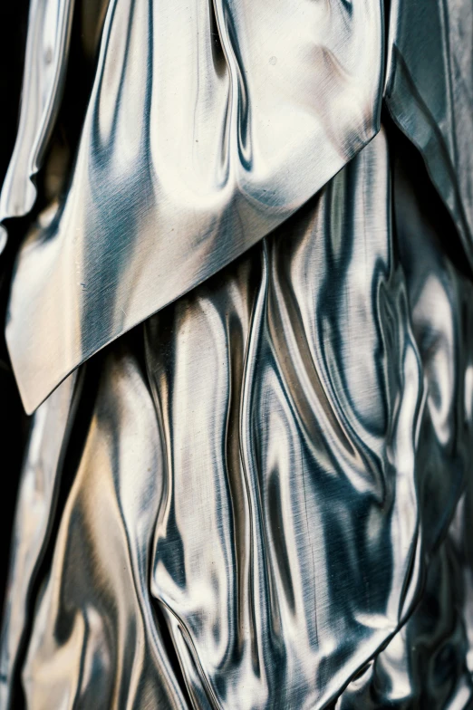 a silver dress on a mannequin mannequin mannequin mannequin mannequin mannequin mannequin manne, an abstract sculpture, inspired by Hendrick Goudt, unsplash, baroque, 8k fabric texture details, in a silver silk robe, yohji yamamoto, zoomed in