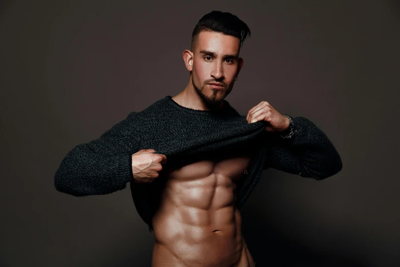 a shirtless man is posing for a picture, wearing a dark sweater, stomach vibes, profile image