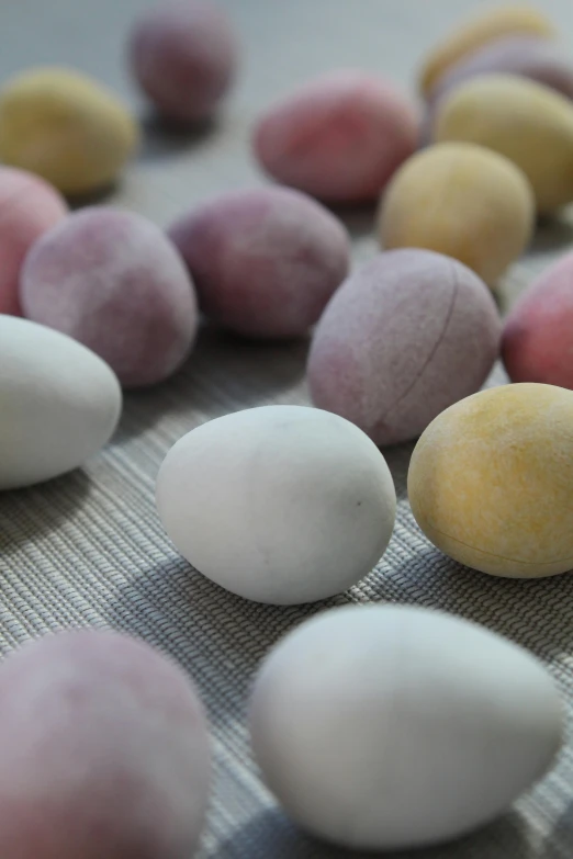 a bunch of eggs sitting on top of a table