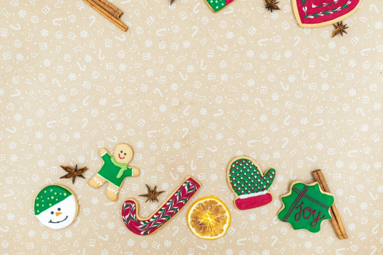 a couple of cookies sitting on top of a table, a picture, ornaments, tileable, background image