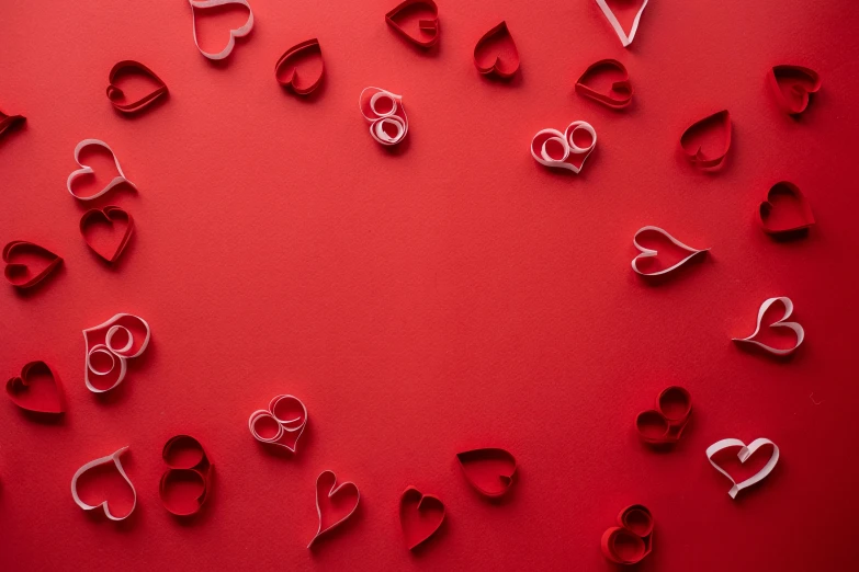 paper hearts arranged in a circle on a red background, by Julia Pishtar, pexels, 15081959 21121991 01012000 4k, sweet looks, making out, paper quilling