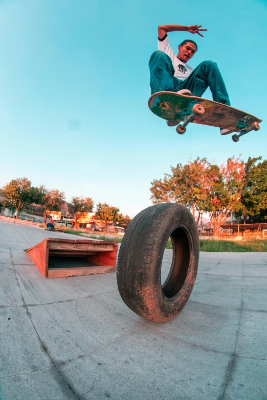 a man flying through the air while riding a skateboard, by Sven Erixson, unsplash, photorealism, go pro footage, circle pit, high quality photo, trucks