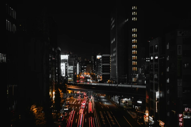 a black and white photo of a city at night, pexels contest winner, ukiyo-e, night color, brutalist city, thumbnail, night time footage