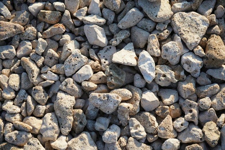 a pile of rocks sitting next to each other, an album cover, unsplash, 4 k seamless mud texture, ((rocks)), detailed product image, detail shot