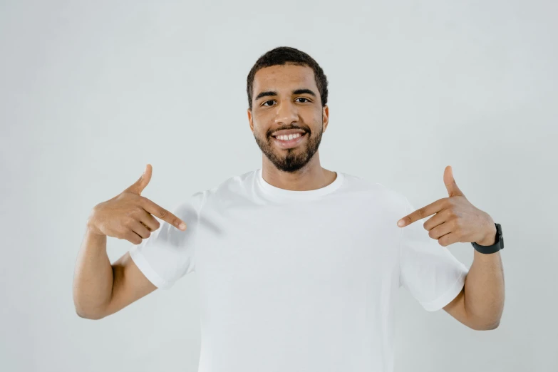 a man in a white shirt giving a thumbs up, pexels contest winner, mixed race, symmetrical pose, ad image, two male