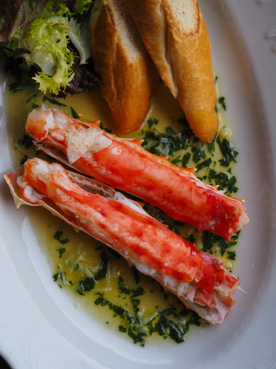 a close up of a plate of food on a table, crustacean, thumbnail, madrid, 🎀 🧟 🍓 🧚