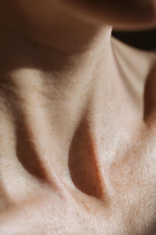 a close up of a person brushing their teeth, by Elsa Bleda, trending on pexels, hyperrealism, scales covering her chest, neck wrinkles, crisp contour - lines, vascularity