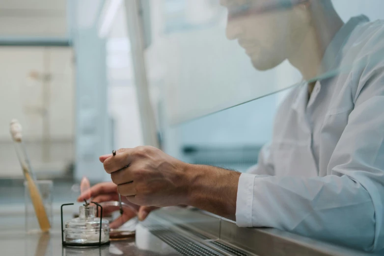 a close up of a person using a cell phone, scientific glassware, plating, anaesthetic, unbeatable quality