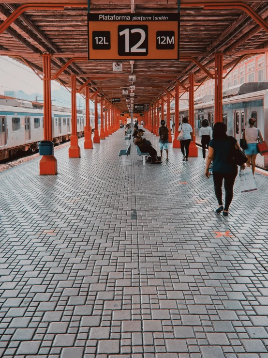 a train station with people walking on the platform, inspired by Steve McCurry, pexels contest winner, hyperrealism, mosaic floor, south jakarta, orange and white color scheme, 🚿🗝📝