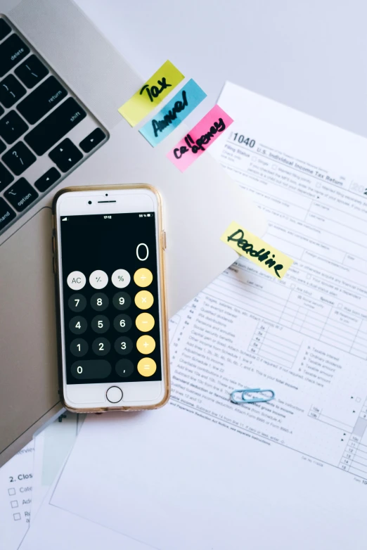 a calculator sitting on top of a desk next to a laptop, by Robbie Trevino, pexels, process art, corporate phone app icon, snapchat photo, ilustration, contain