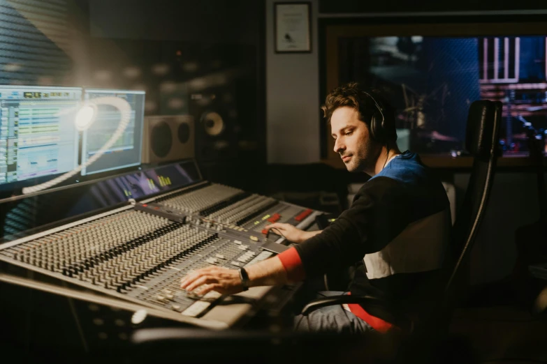 a man sitting in front of a mixing desk, by Meredith Dillman, pexels contest winner, lachlan bailey, avatar image, raphael lecoste, high quality artwork