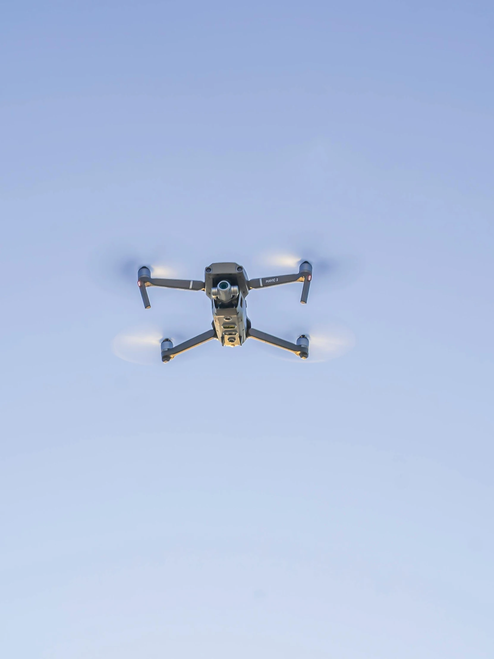 a close up of a drone flying in the sky, by Emanuel Witz, 8 k image