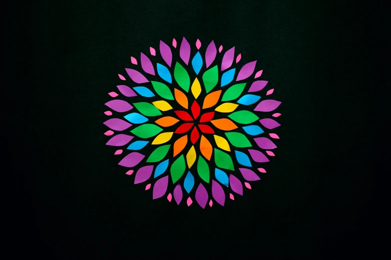 a colorful flower on a black background, inspired by Okuda Gensō, mandala ornament, cotton, 3 colour print, (neon colors)