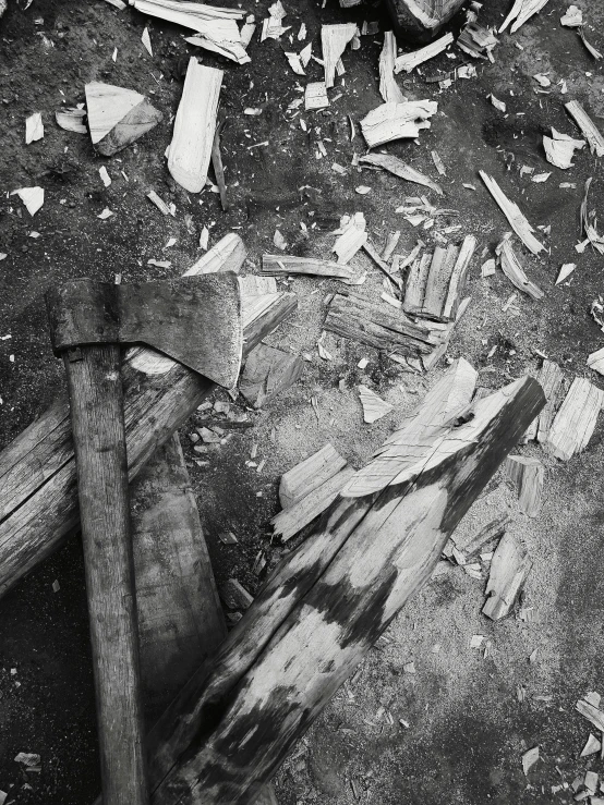 a black and white photo of a pile of wood, by andrei riabovitchev, with axe, damaged film, by greg rutkowski, sergey krasovskiy