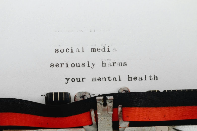 an old typewriter with the words social media seriously harms your mental health, an album cover, by Sam Black, trending on pexels, a black choker, 15081959 21121991 01012000 4k, panel, coloured