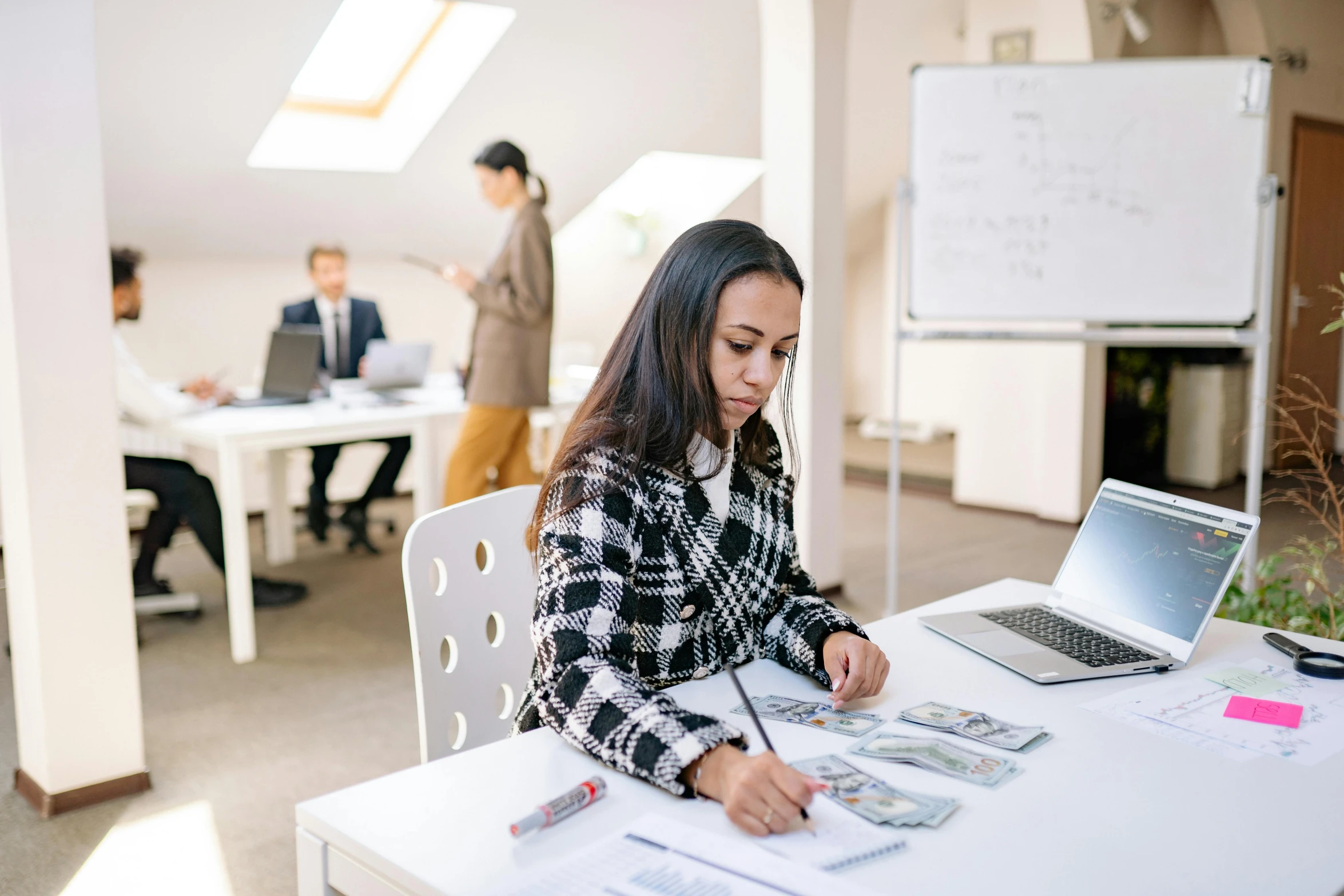 a woman sitting at a table working on a laptop, pexels contest winner, in a meeting room, te pae, carefully drawn, stacked image