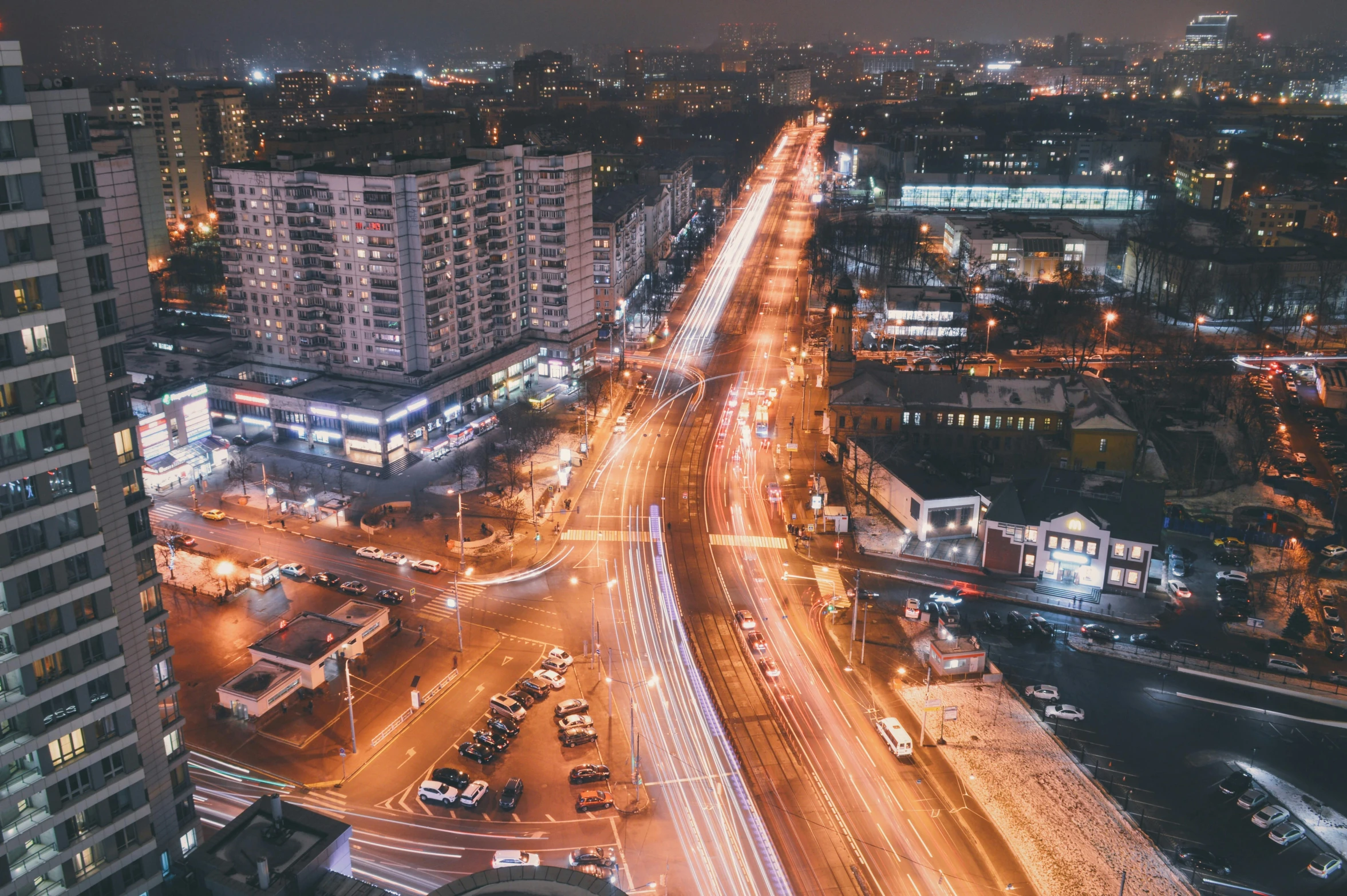 an aerial view of a city at night, by Adam Marczyński, street of moscow, ultrawide cinematic, high quality image”, 000 — википедия