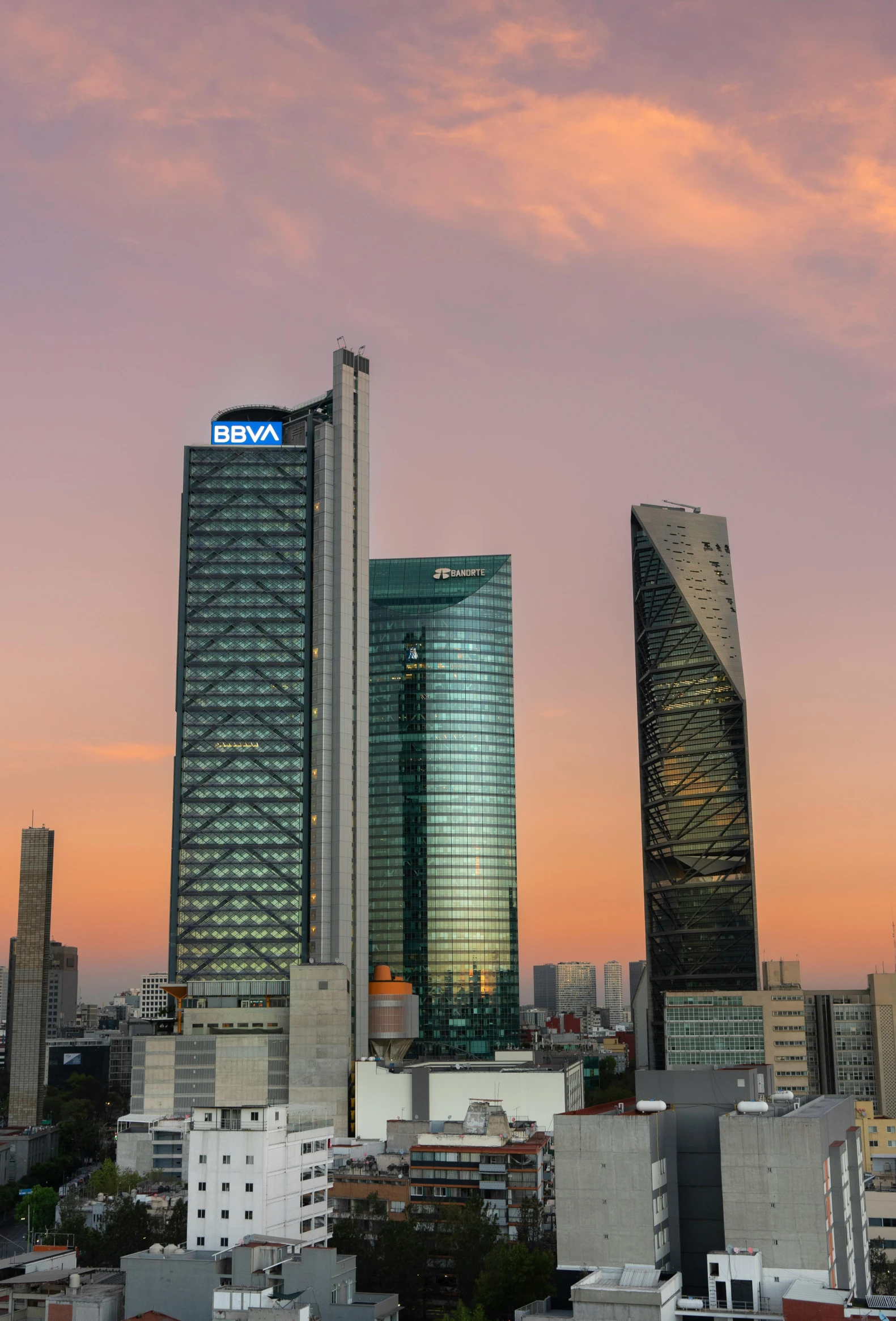 a view of some very tall buildings in a city, inspired by david rubín, pexels contest winner, mexico city, avatar image