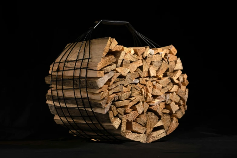 a large pile of wood sitting on top of a table, a portrait, in front of a black background, detailed product shot, woodfired, nets