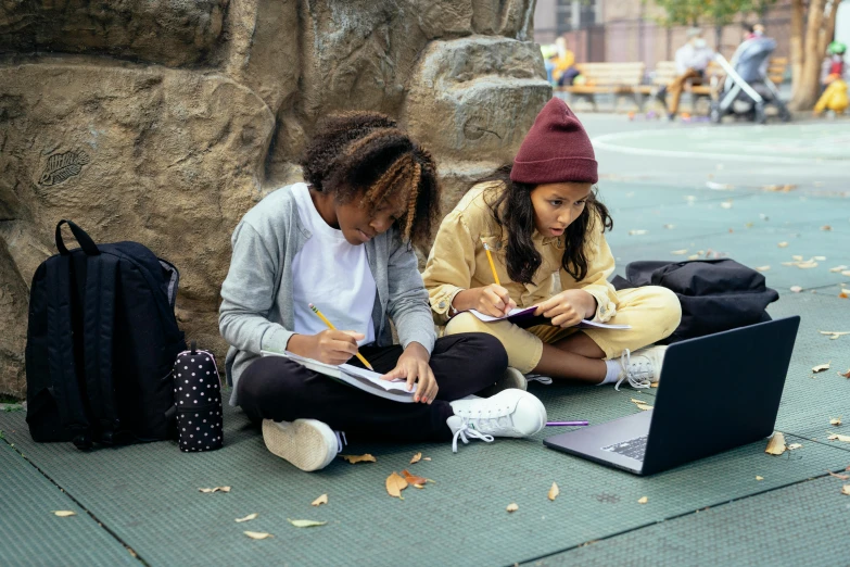 two girls sitting on the ground working on their laptops, a drawing, pexels contest winner, graffiti, school courtyard, willow smith young, in a square, 15081959 21121991 01012000 4k
