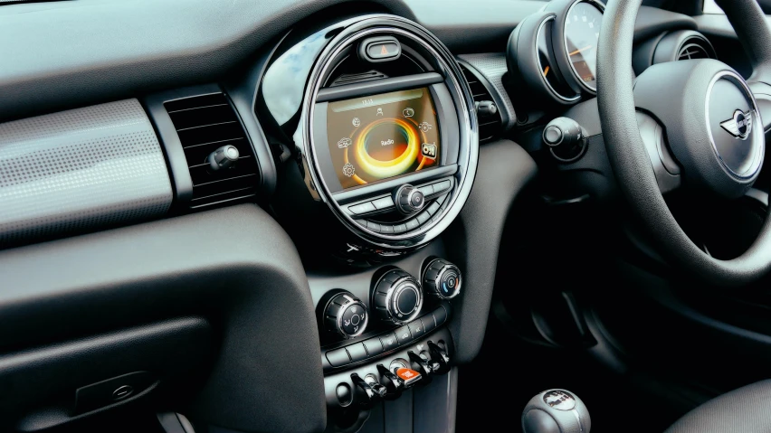 a view of the dashboard of a mini cooper cooper cooper cooper cooper cooper cooper cooper cooper cooper cooper cooper cooper cooper cooper cooper cooper cooper cooper cooper, by Joe Bowler, unsplash, holographic display lenses, all enclosed in a circle, yellow and black trim, intricate features