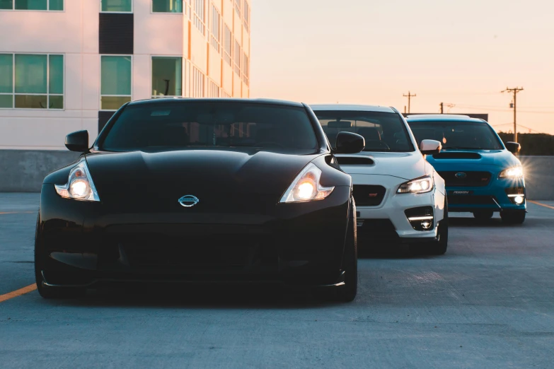 a group of cars parked next to each other in a parking lot, a photo, unsplash, avatar image, sportcar, mid body shot, front lit