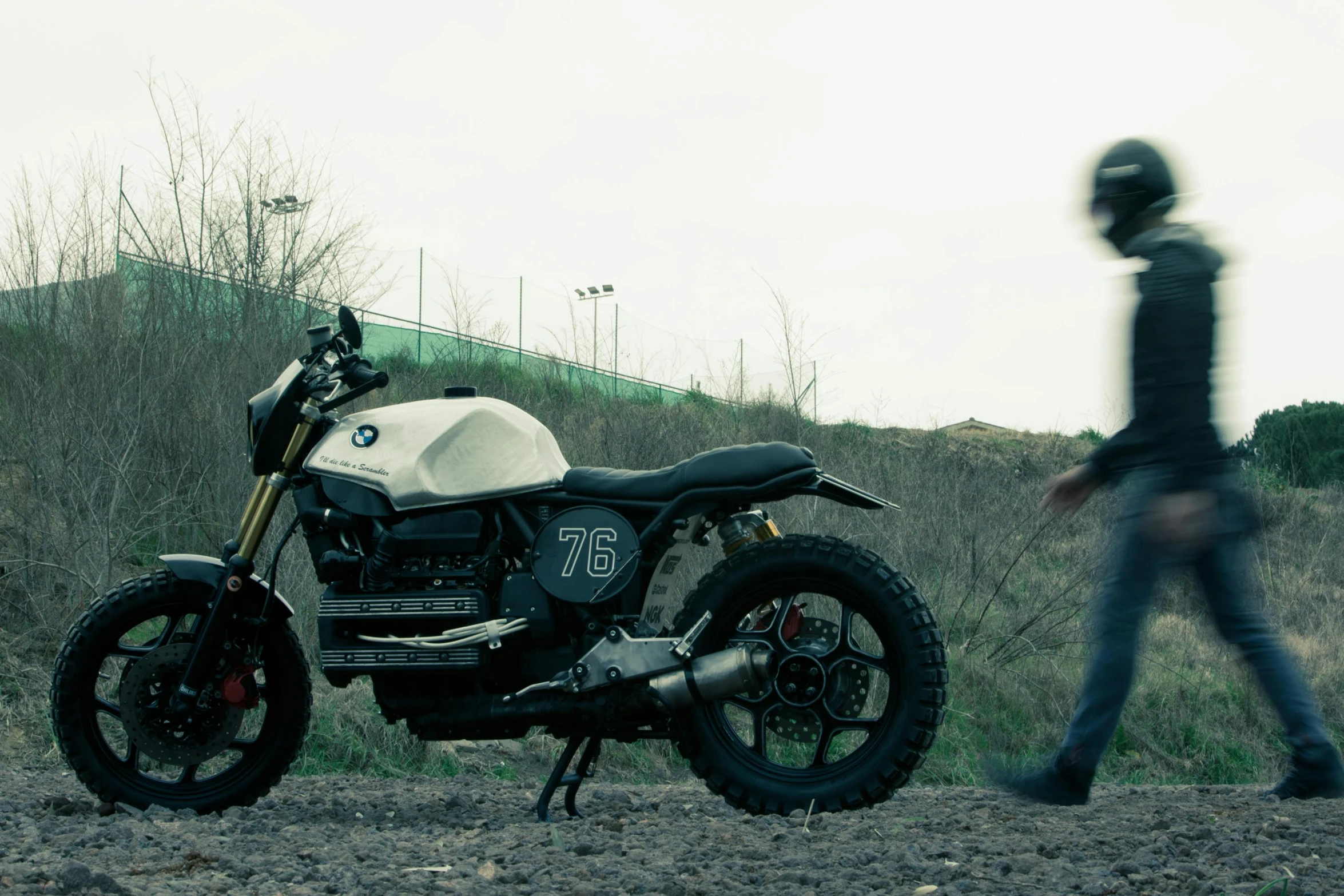 a motorcycle parked on the side of a dirt road, inspired by Alex Petruk APe, baroque, bmw, testing custom, 7 0 mm photo, octane]