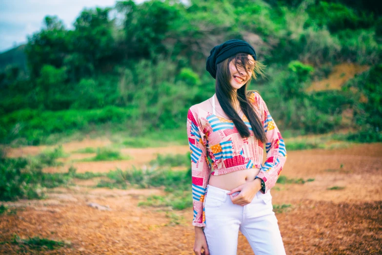 a woman standing on top of a dirt field, a portrait, pexels contest winner, kawaii shirt and jeans, in style of lam manh, colorful outfit, avatar image