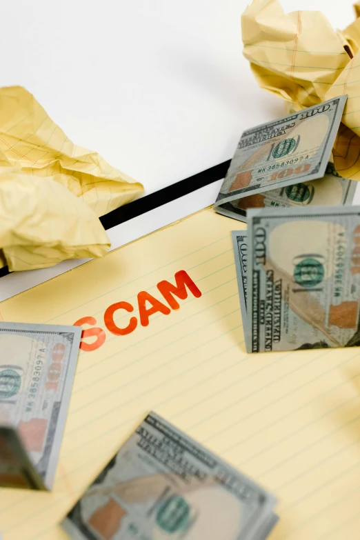 a pile of money sitting on top of a piece of paper, scamming, webcam, photo still of, censored