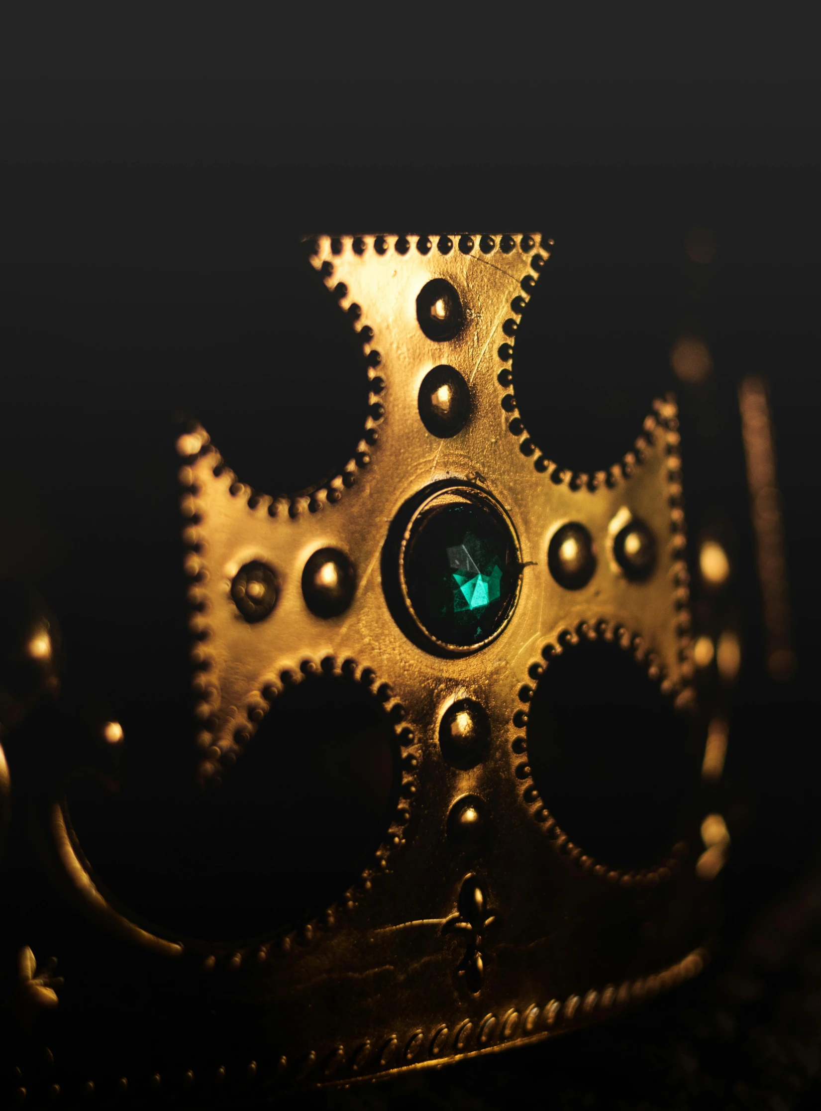 a gold crown sitting on top of a table, trending on polycount, renaissance, an extreme closeup shot, wearing a bejeweled mask, leviathan cross, masterpiece ; behance hd