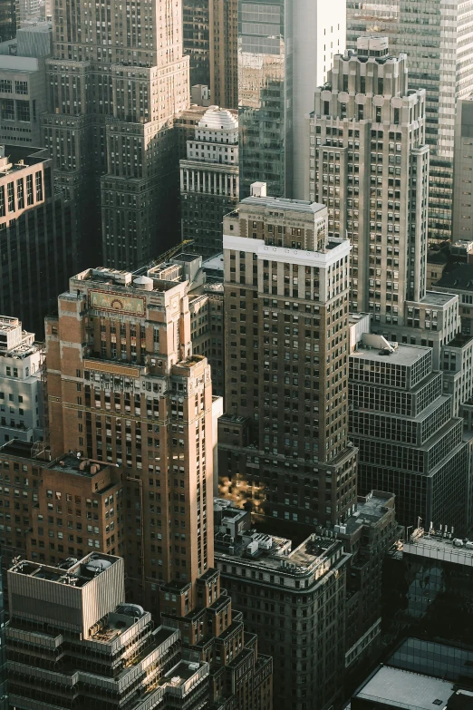 a view of a city from the top of a building, new york buildings, art deco office buildings, small buildings, tall minimalist skyscrapers