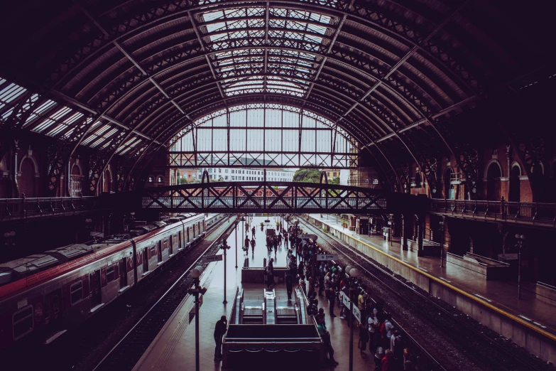 a train station filled with lots of people, by Lucia Peka, pexels contest winner, art nouveau, square, julia hetta, thumbnail, spanish